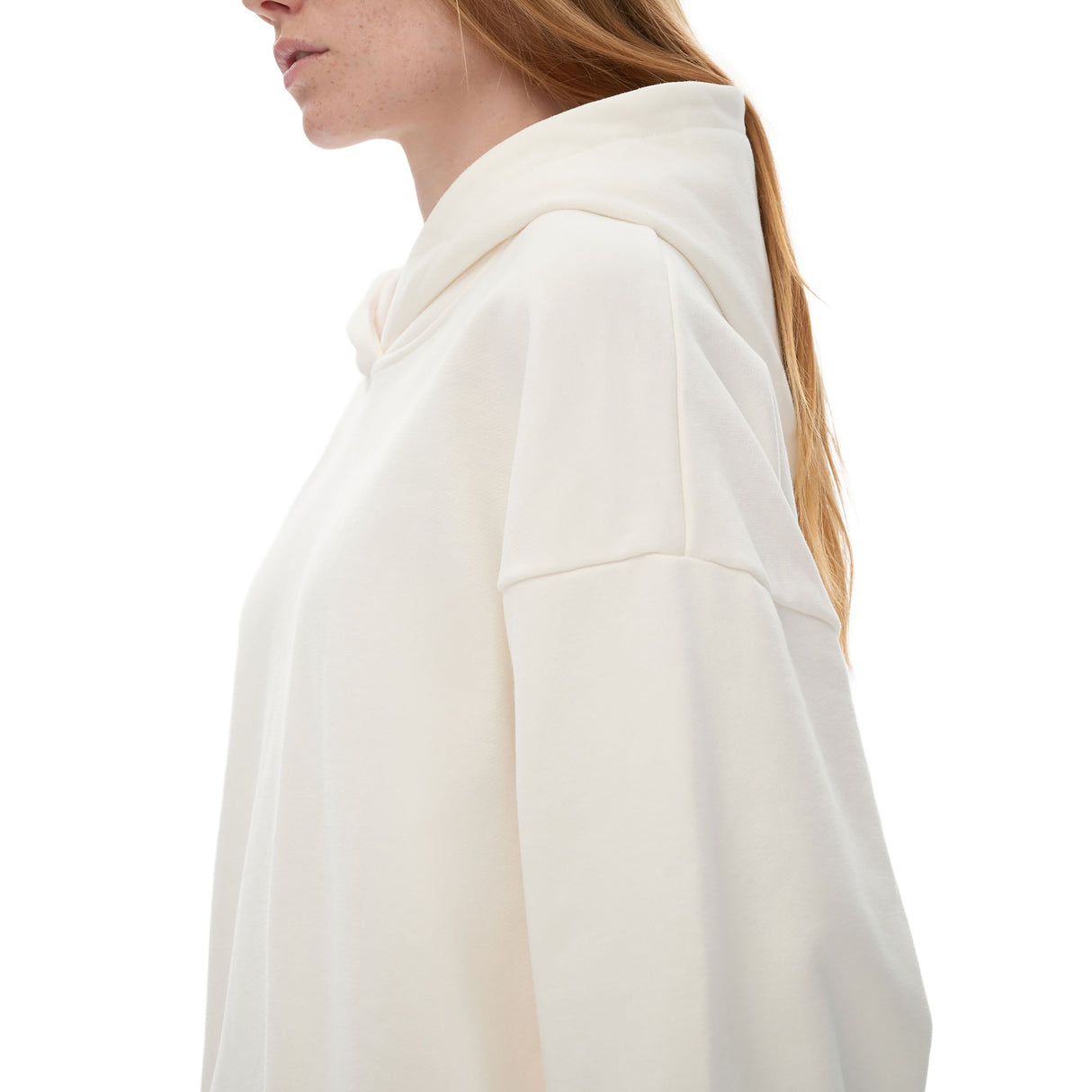 Bone oversized Nami heavyweight hoodie by ODMPOD featuring a relaxed fit and soft fabric, displayed on a hanger.