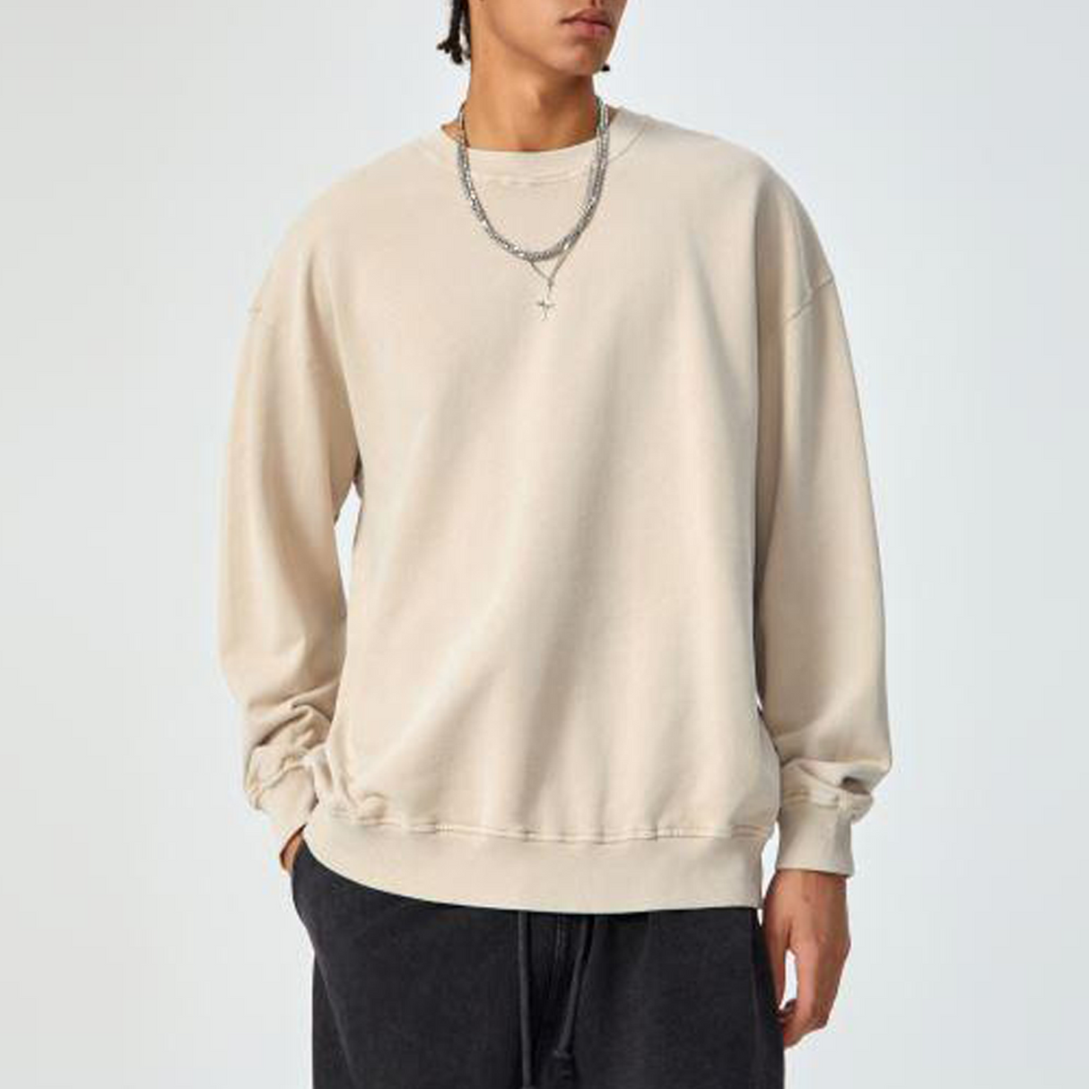 Light apricot ODMPOD MEW2 Heavy Long Sleeve shirt displayed on a flat surface.