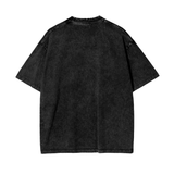 Black Zenitsu acid wash oversized T-shirt by ODMPOD, featuring a relaxed fit and distressed style, displayed on a flat surface.