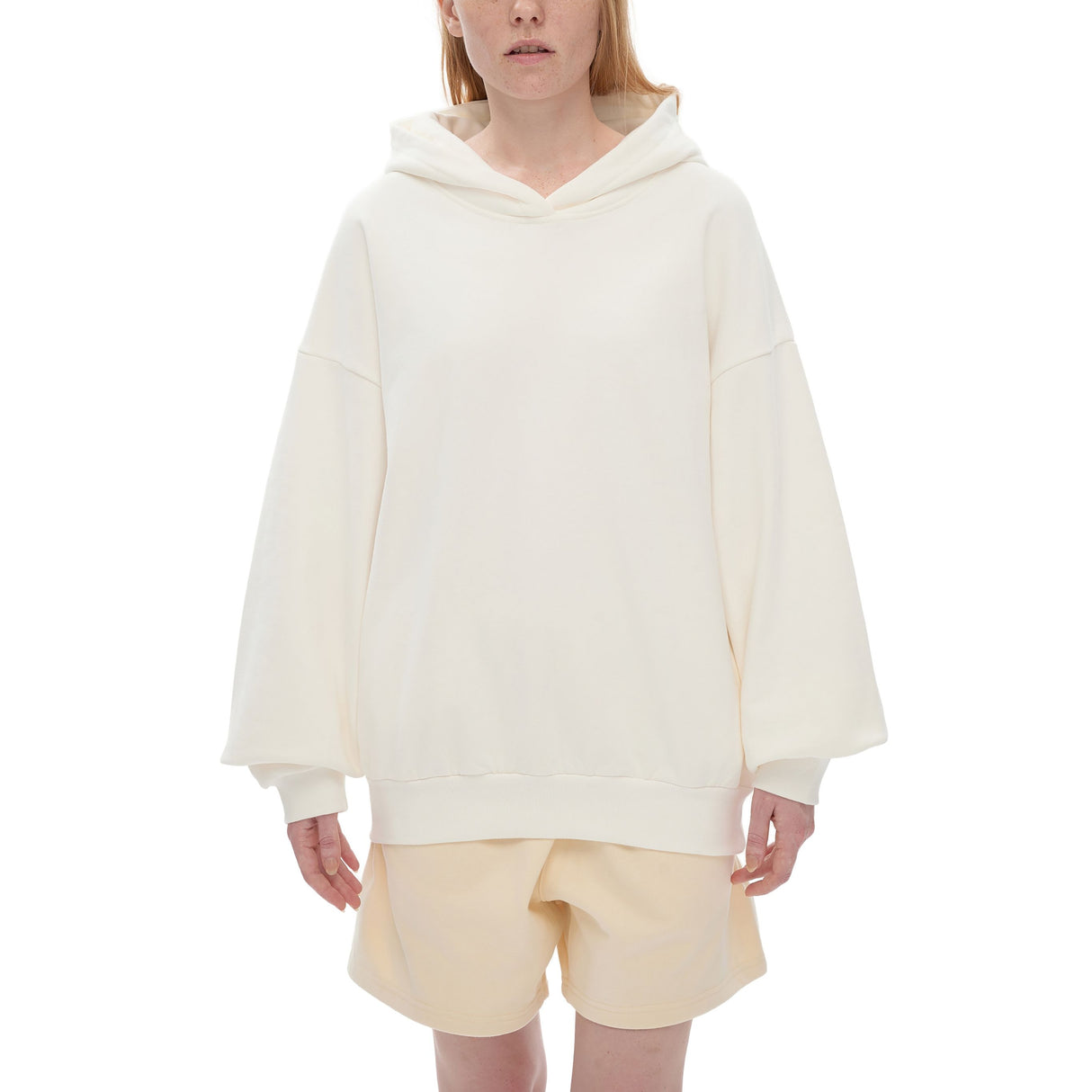 Bone-colored oversized Nami heavyweight hoodie by ODMPOD featuring a relaxed fit and soft, thick fabric for comfort.