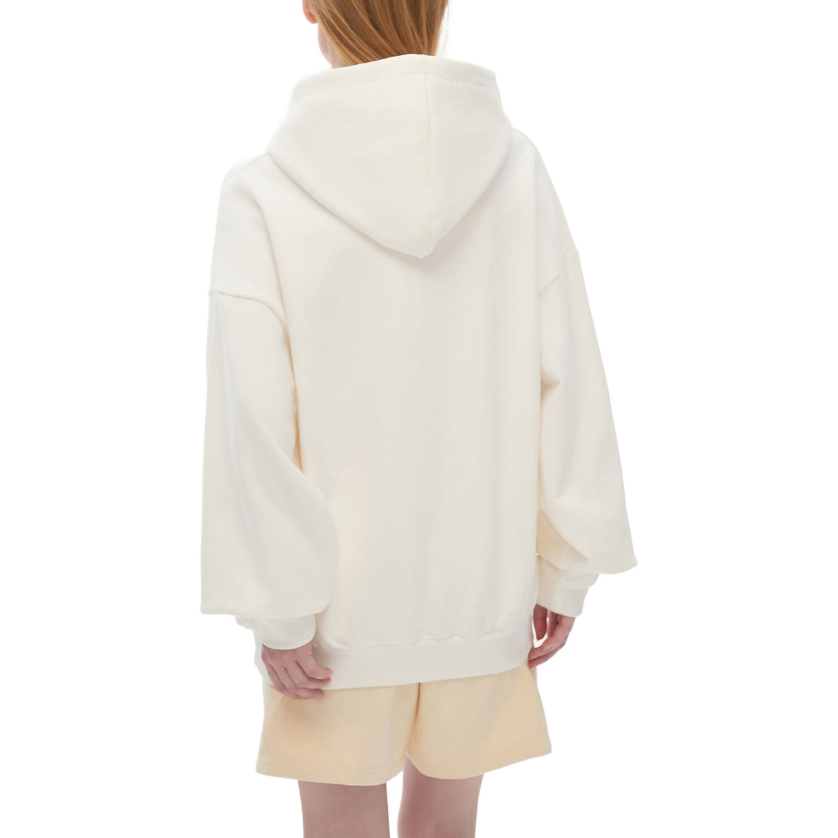 Bone-colored oversized Nami heavyweight hoodie by ODMPOD, shown with a relaxed fit and soft fabric detail.