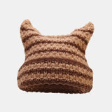 Green-striped Kawaii King knitted beanie with a cozy, cute design, perfect for warm winter wear.