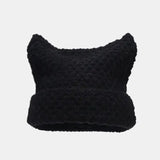 Green-striped Kawaii King knitted beanie with a cozy, playful design, perfect for adding a fun touch to winter outfits.
