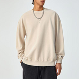 Light apricot ODMPOD MEW2 Heavy Long Sleeve shirt displayed on a flat surface.
