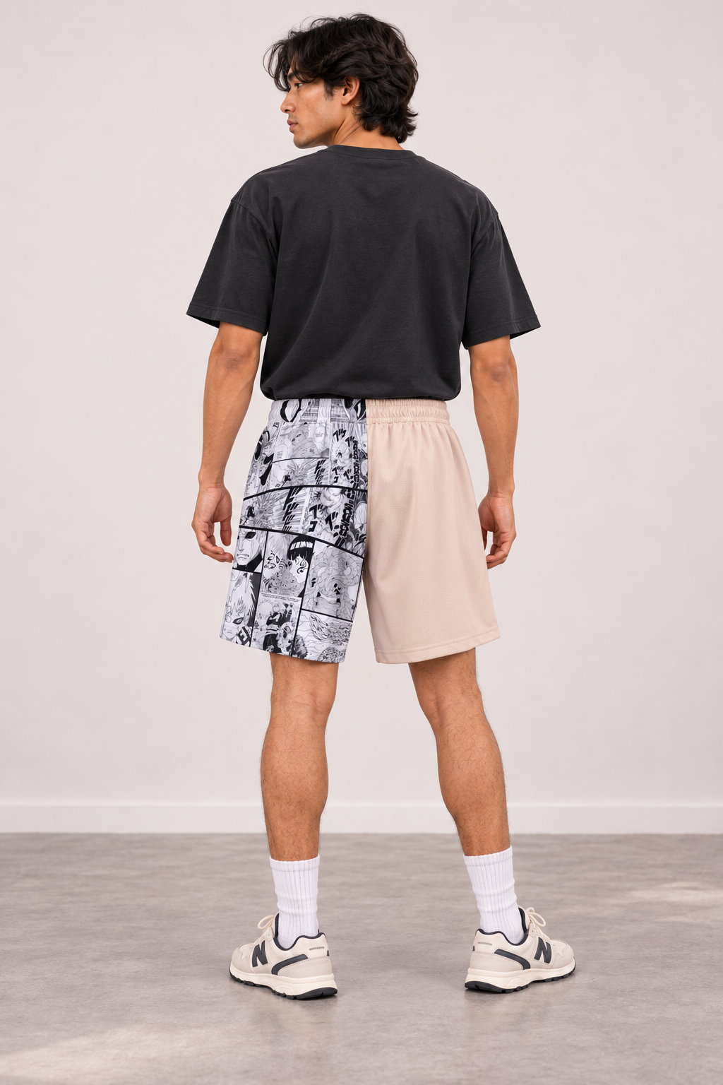 Love Manga Boardshorts styled on male model, back view showing manga panels and sand beige fabric