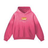 Pink oversized hoodie from ODMPOD featuring the New Queen of Anime Heavyweight Sunfade design on the front.