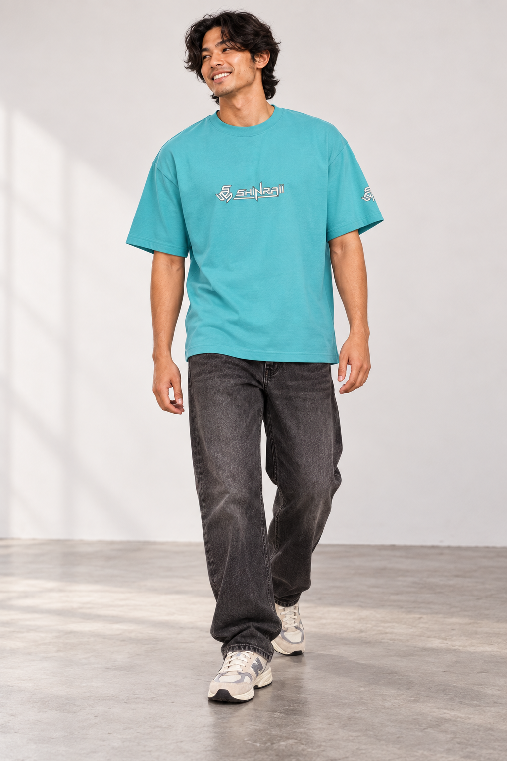 Aqua Shinraii Extreme Heavyweight T-Shirt, front view on model with charcoal jeans.