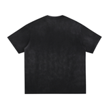 Vintage black and gray Explosion Hero T-shirt by ODMPOD with washed and hand-frayed details, featuring a bold explosion graphic.