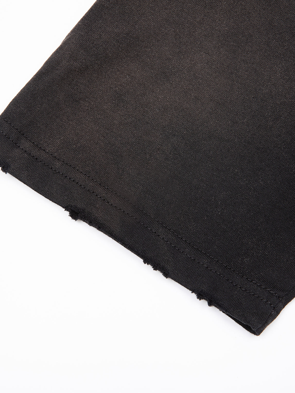 Black and gray Misa vintage wash frayed T-shirt from ODMPOD, featuring a distressed, casual design with frayed edges and a relaxed fit.