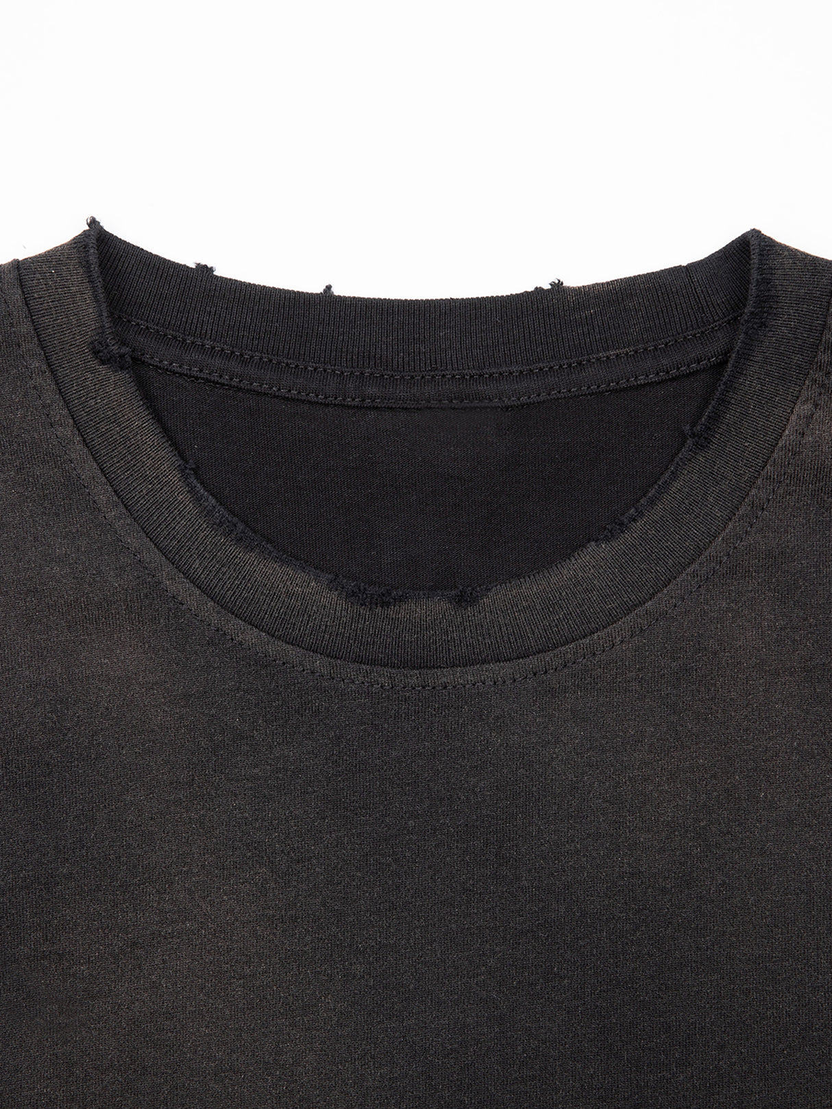 Black and gray Misa Vintage Wash Frayed T-Shirt by ODMPOD, featuring distressed edges and a casual, vintage-inspired design.