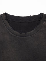 Black and gray Misa Vintage Wash Frayed T-Shirt by ODMPOD, featuring distressed edges and a casual, vintage-inspired design.