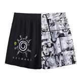 Black V2 Uzumaki Boardshorts by Yoycol, showing lightweight fabric and detailed Uzumaki pattern, suitable for swimming and beachwear.