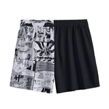 Black V2 Uzumaki Boardshorts by Yoycol, showing the lightweight fabric and Uzumaki-themed design on the shorts.