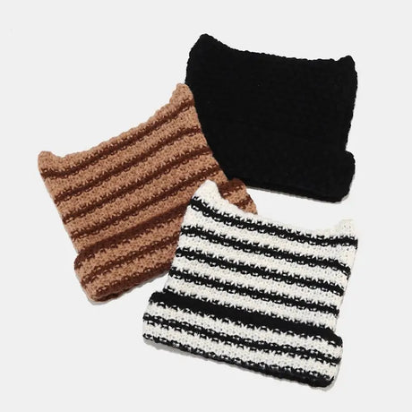 Kawaii King knitted kawaii beanie in pastel colors, featuring a cute, cozy design with playful patterns and soft yarn.