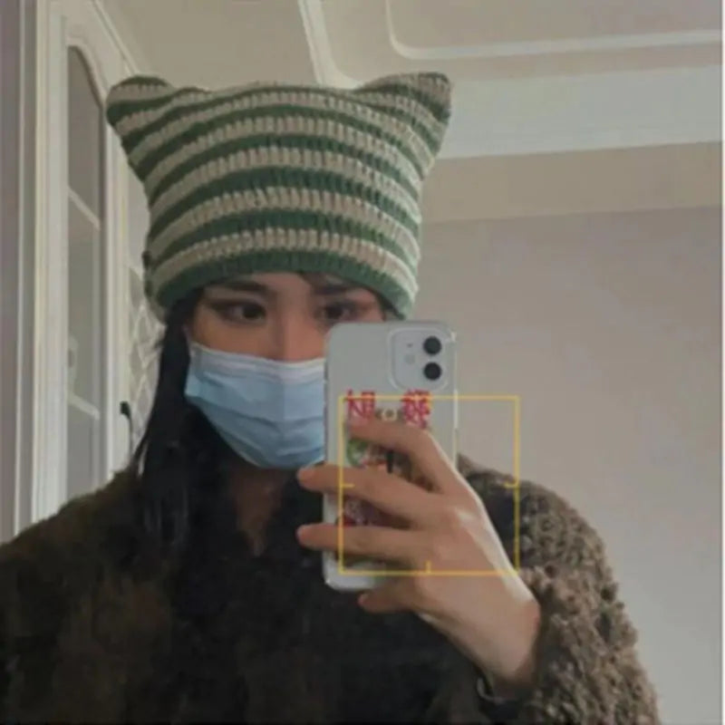 Green-striped Kawaii King knitted beanie with a cute, cozy design, perfect for winter warmth and stylish casual wear.