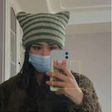 Green-striped Kawaii King knitted beanie with a cute, cozy design, perfect for winter warmth and stylish casual wear.