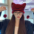 Red Kawaii King knitted wool beanie with a cozy, kawaii style, featuring a soft, thick knit pattern and a cute, playful look.
