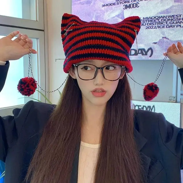 Red Kawaii King knitted wool beanie with a cozy, kawaii style, featuring a soft, thick knit pattern and a cute, playful look.